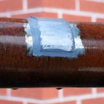 Miejscowa naprawa znacznego uszkodzenia korozyjnego rury, na której osadza się kondensat, z użyciem materiału Belzona 1212 Miejscowa naprawa znacznego uszkodzenia korozyjnego rury, na której osadza się kondensat, z użyciem materiału Belzona 1212