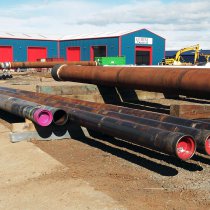 Mocowania konstrukcyjne podajnika przetaczającego wymagające powłoki zabezpieczającej Mocowania konstrukcyjne podajnika przetaczającego wymagające powłoki zabezpieczającej