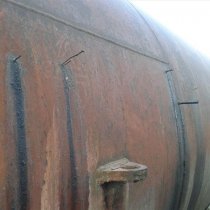 Wyciek ze zbiornika przez drewniane zatyczki